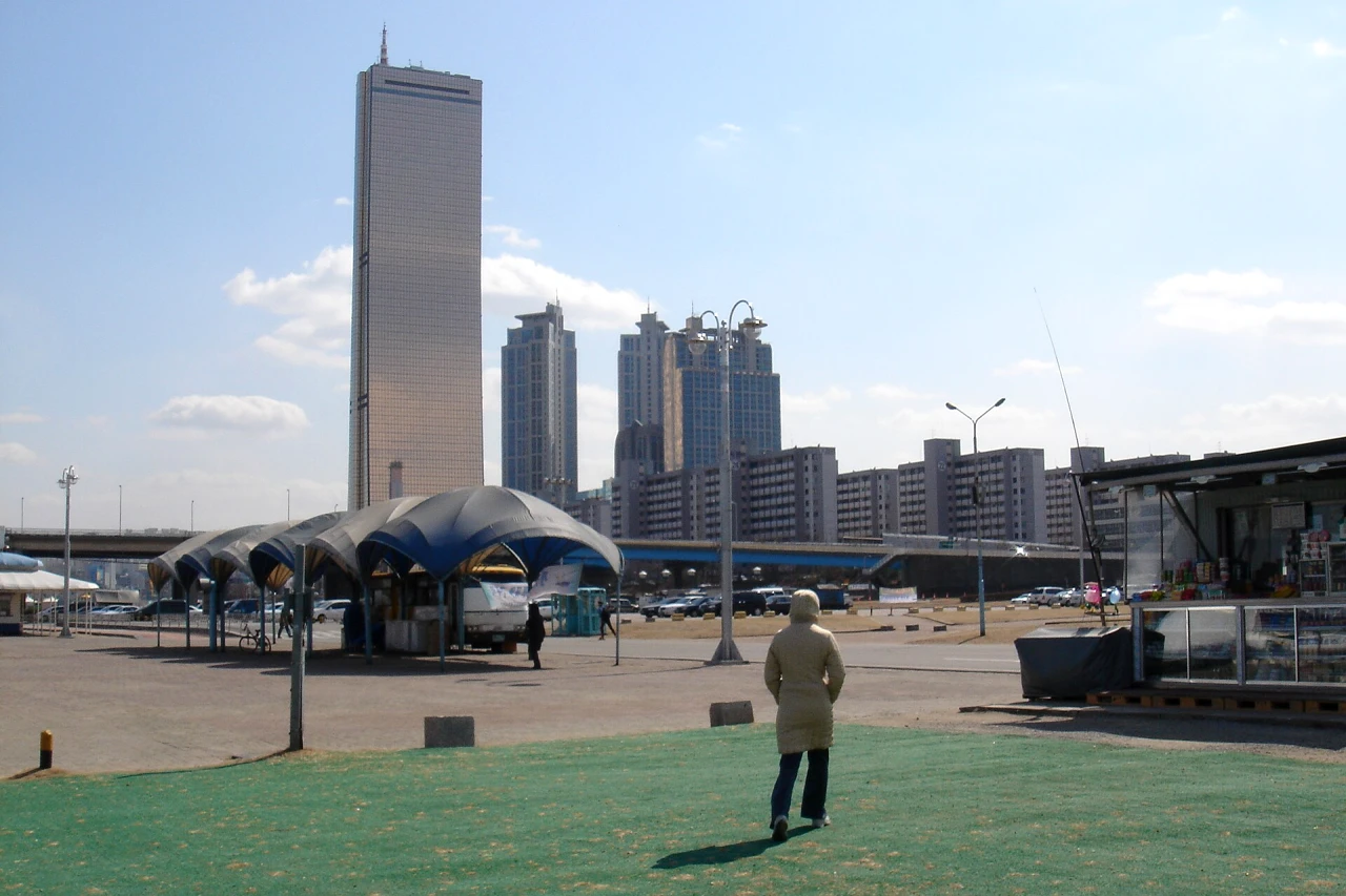 Incheon International Airport terminal with escalators and travellers, Korea