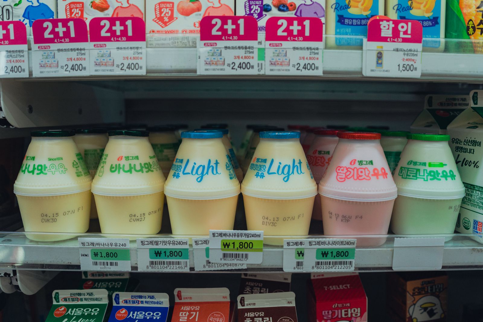 Colourful Korean drinks displayed in a Seoul convenience-store refrigerator